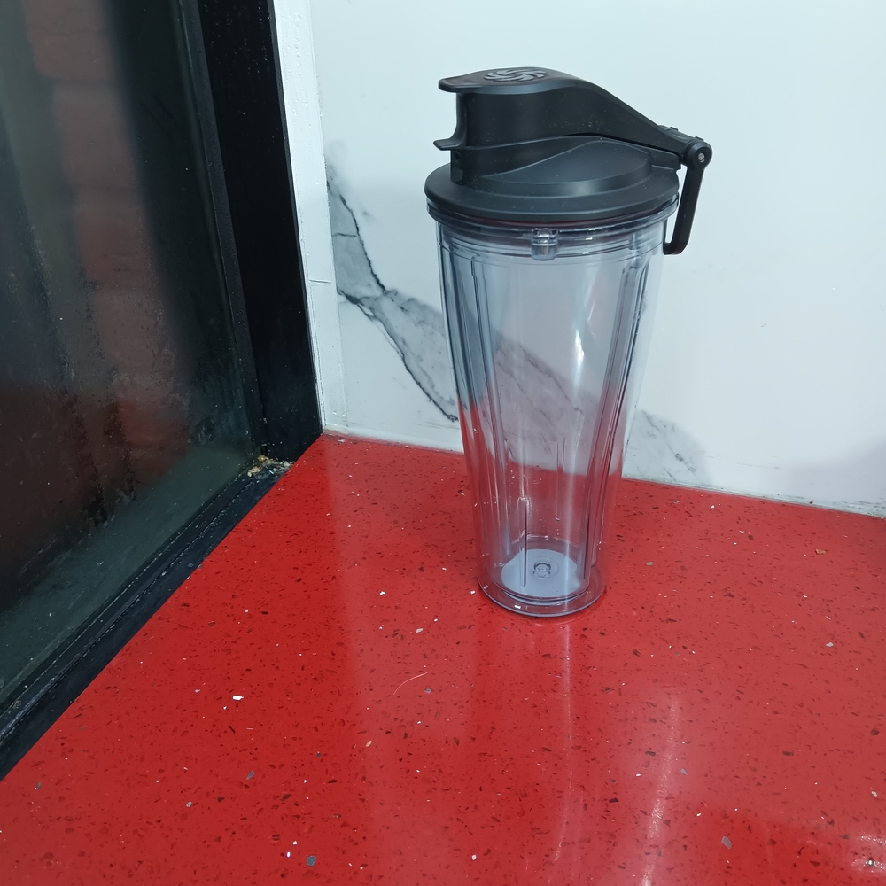 Clear Plastic Shaker Bottle with Black Lid